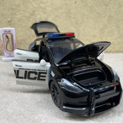 ​Mô hình xe Police Mỹ Tesla Model CX90  tỷ lệ 1:24