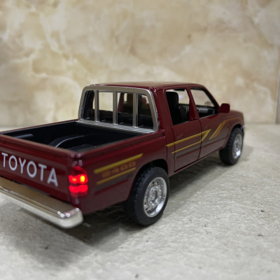 ​Mô hình xe Toyota Hilux Mughty tỷ lệ 1:32