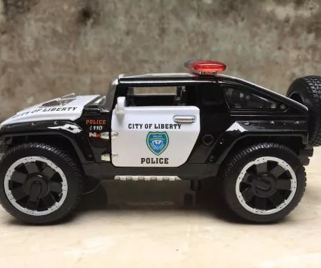 ​Mô hình xe Cảnh sát Hummer HX  tỷ lệ 1:32