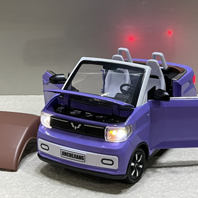 ​Mô hình Trang trí xe ô tô điện Wuling EV MINI 1:18 kim loại (XWUL18EV)